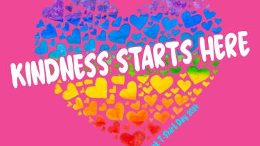 Pink Shirt Day multicoloured hearts on a pink background with the text Kindness Starts Here